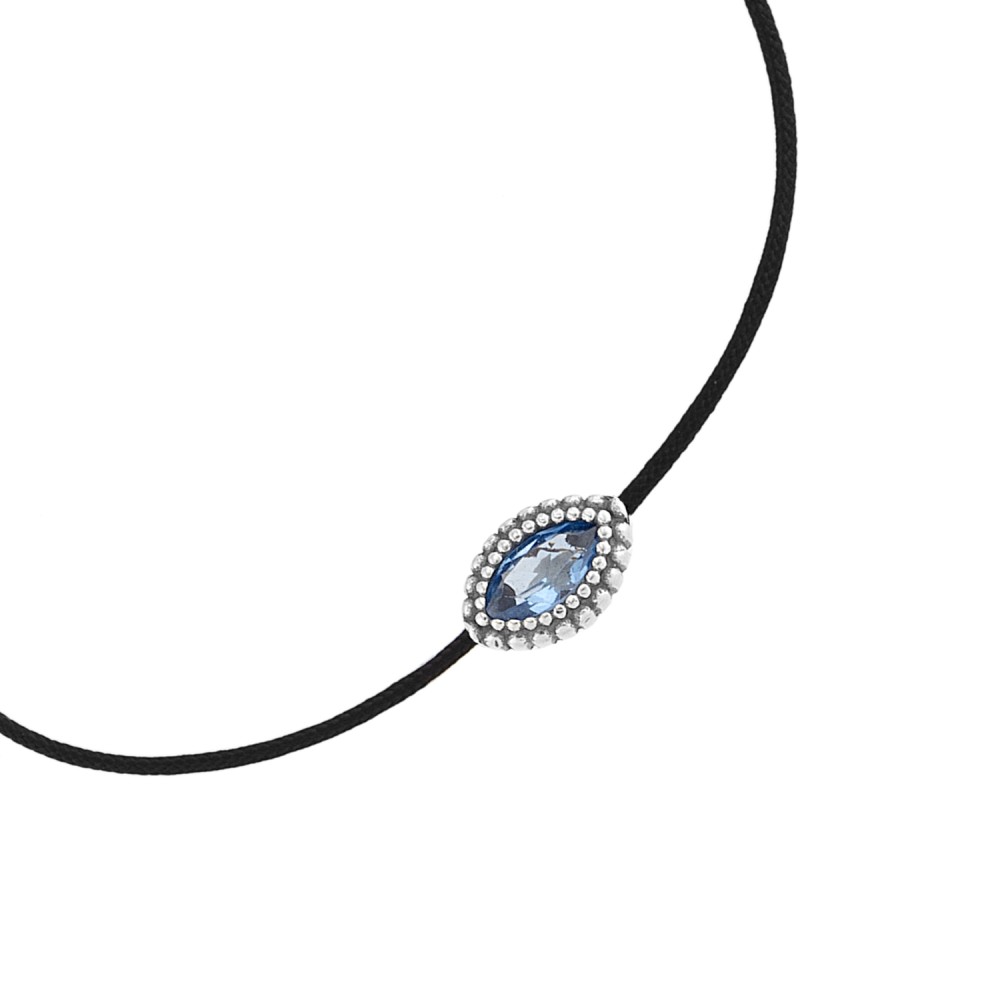 Sterling silver 925°. Light blue CZ on cord bracelet
