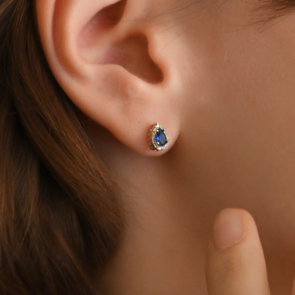 Gold 9ct. Teardrop blue earrings